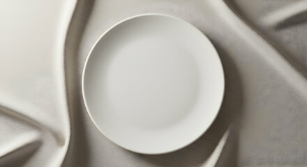 Empty white plate on elegant fabric background perfect for food bloggers restaurants menus and culinary websites showcasing delicious dishes and recipes