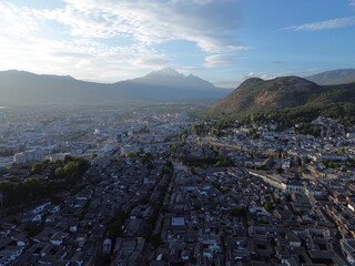 Aerial view of Lijiang city and the Yulong Snowy Mountain in Lijiang, Yunnan, China