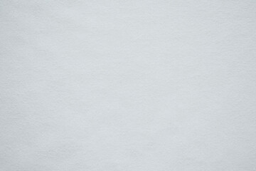 Close-up texture of bright white stretch fabric, white fabric background.