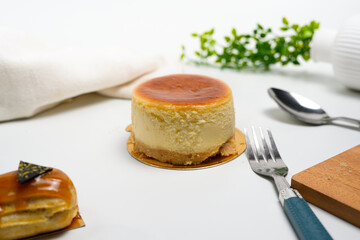 cheesecake concept and props in white studio background