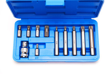 A set of single-sided chrome steel bits in a blue plastic box