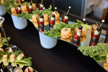 An Elegant Assortment of Gourmet Desserts and Savory Snacks Beautifully Arranged on Table