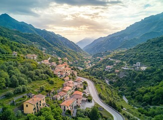 Beautiful, winding asphalt road in the green forest with mountains and clouds in the background, northern Italy. A scenic highway for car travel through the natural landscape of the Alps. Restaurant C