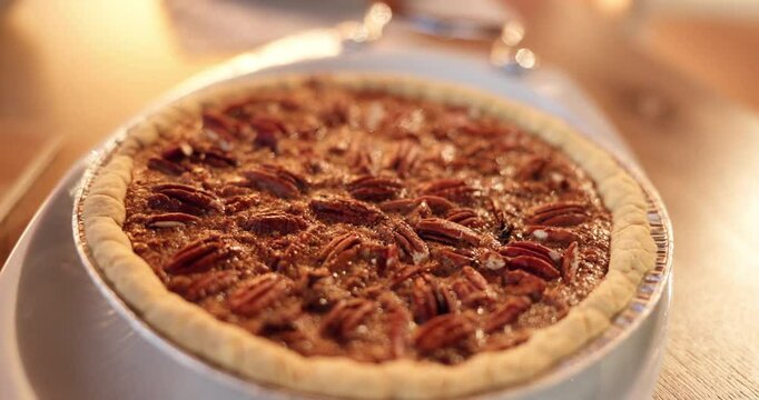 Christmas, holidays and tradition with tart in home for baking, cooking or dessert pastry. Cake, food or pecan pie on counter in kitchen of apartment for festive celebration and winter vacation