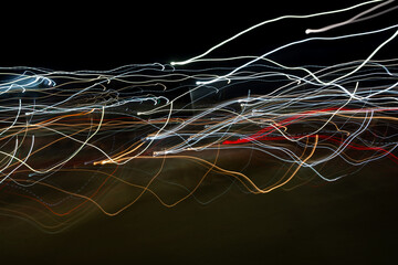 Abstract background with geometric elements and colorful lines on a black background. Copyspace...