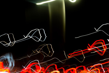 Abstract background with bright, multicolored light rays in motion. Copyspace concept. Photo effect.
