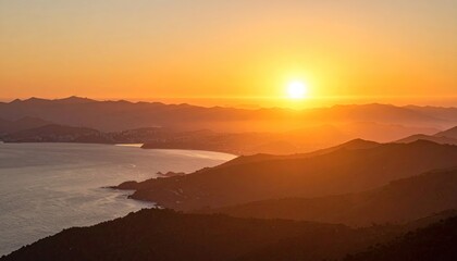 Obraz premium Golden Sunset over Mountains and Sea
