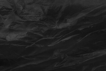 Black plastic bag texture background. Reuse and Recycle cocept.