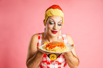 Italian Themed Drag Queen Happily Presenting Spaghetti Dish in Bright Studio Setting