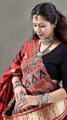 Indian woman in navratri outfit for playing garba. Wearing chaniya choli with gajji silk dupatta...