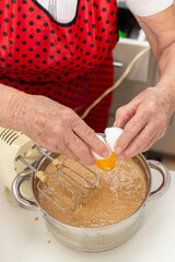 Elderly Woman Making Cookie Dough