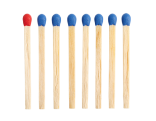 Eight wooden matches are aligned vertically, with one match head in red and the other seven in blue.