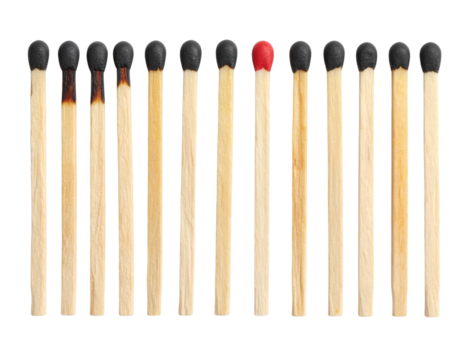 A lineup of wooden matchsticks with one unlit red matchstick standing out among several blackened, burnt matchsticks.