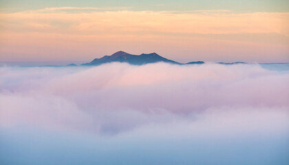 Serene fog-covered mountains with soft pastel haze in dusty pink and lavender, minimal and poetic landscape

