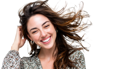 Smiling woman with flowing hair in a joyful pose, exuding happiness and positivity.