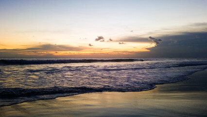 beautiful dramatic landscape of sunset on the sea beach