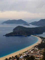 Fototapeta premium beautiful landscape from babadag mountain to Oludeniz beach in Turkey