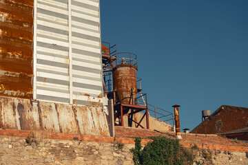 Rusty Industrial Structures with Striped Wall
