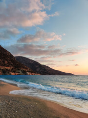 beautiful dramatic landscape of sunset on the sea beach