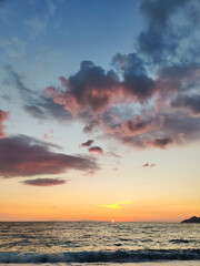 beautiful dramatic landscape of sunset on the sea beach