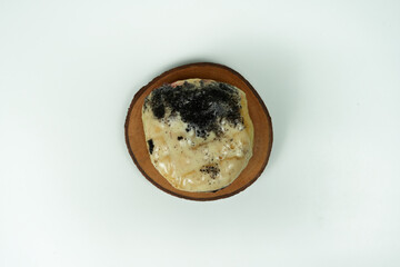 taking single donut in white studio background
