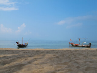 Fototapeta premium fishing motor boats moored on the sea coast