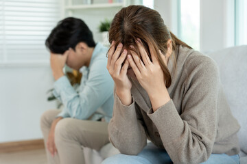Divorce. Asian couples are desperate and disappointed after marriage. Husband and wife are sad,...