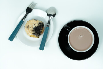 Delicious Pastry with donut and chocolate drink on a White Background