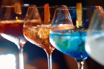 Colorful cocktail array showcasing vibrant mixology and drink diversity at a bar setting