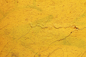 yellow concrete background with with cracks