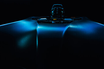 Close-up view of an electric vehicle's center console, showcasing the control panel, which...