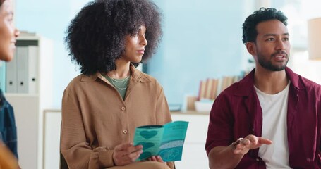 Therapy, group and business people with pamphlet in circle for support, counseling session and help. Mental health, HR counselor and workers in discussion and talking for stress management workshop