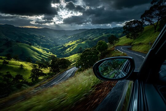 Curving Mountain Road Through Lush Green Hills Seen From Car Window at Golden Hour perfect for travel ads, road trip blogs, automotive lifestyle magazines