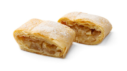 Pieces of tasty apple strudel with powdered sugar isolated on white