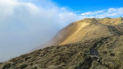 ​​clouds arriving over the mountain ridge
