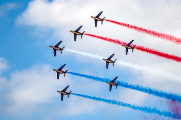 Aerobatic demonstration from the Patrouille de France flying in formation . The French Air and...