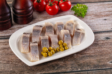 Slided marinated salted herring fillet