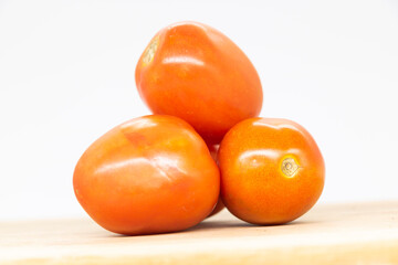 Fresh group of red tomato on white background