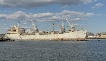 old abandoned ship on brooklyn red hook waterfront hudson river narrows lower new york bay (ruined...
