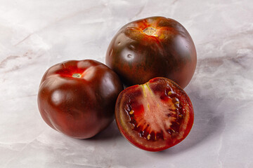 Raw juicy sweet tomato Kumato