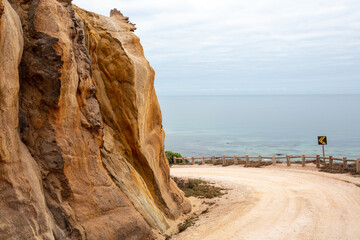 Rock Formations and Sandy Beach at Low Tide in Santa Cruz, Torres Vedras, Portugal