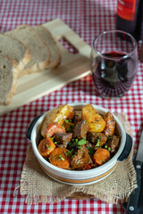 Hearty beef stew with vegetables and rustic bread