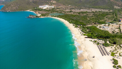 Caribbean Beach Resort with Umbrellas and Sandy Shoreline