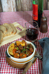 Hearty beef stew with vegetables and wine