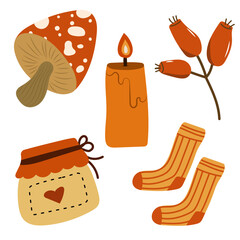 Autumn cozy elements set with mushroom, candle, berries and warm socks.
