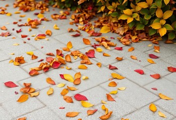 Tiny crimson, gold, and brown leaves scattered on cool grey patio tiles,  muted,  background