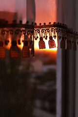 Lace curtains. Retro curtains in the rays of the setting sun. 