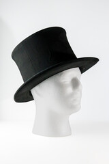 antique milliner made silk folding top Hat isolated on white background