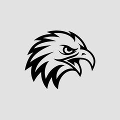 Obraz premium Tribal Eagle Head Silhouette with Geometric Feather Design on Light Background