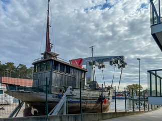 Old yacht in the port of Mrzezyno on the Baltic Sea in Poland